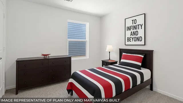 a bedroom with a bed and a closet