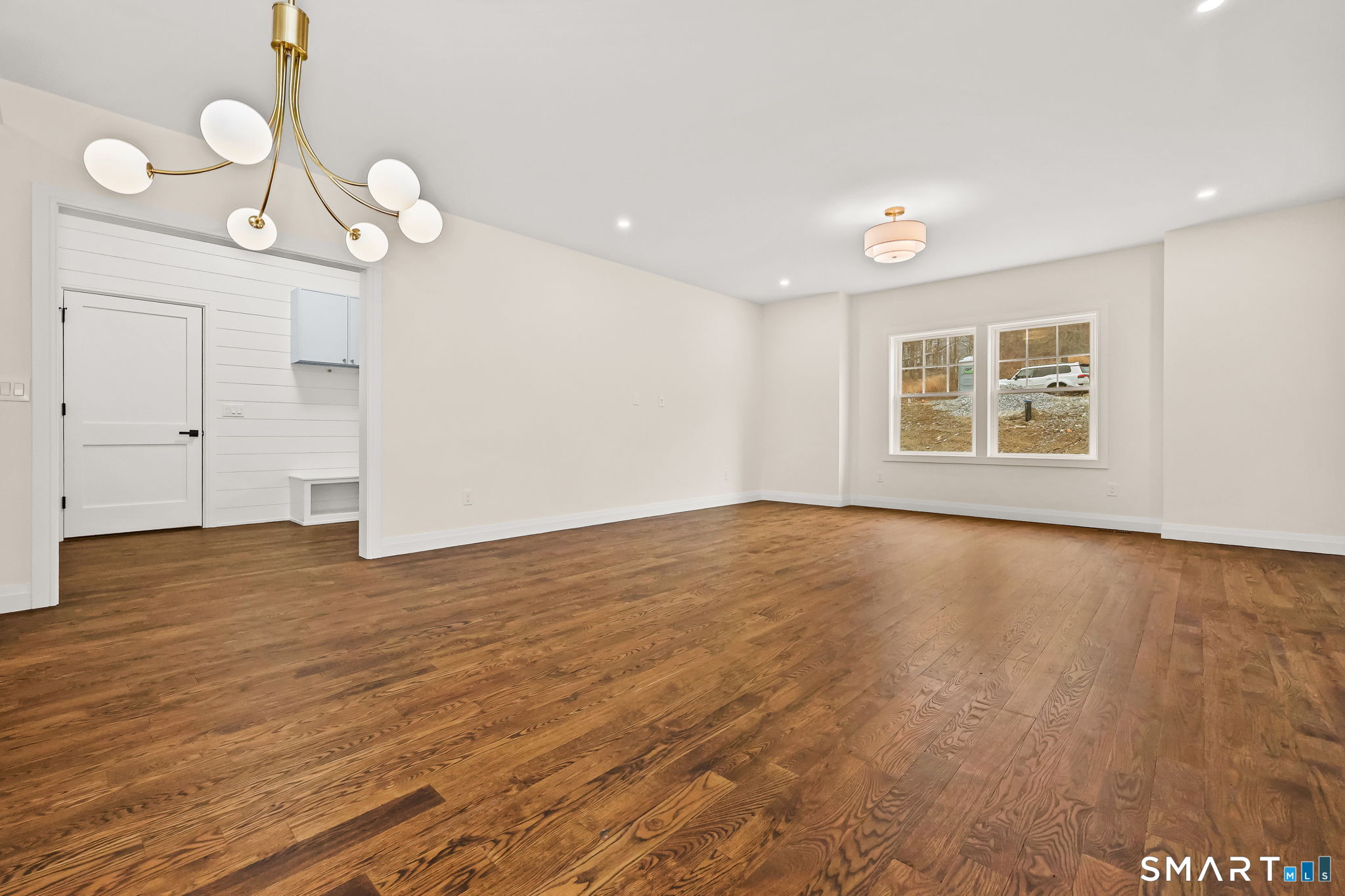 41 Crown View Drive Monroe, CT 06468 - Photo 15 of 41 a view of a room with wooden floor and window