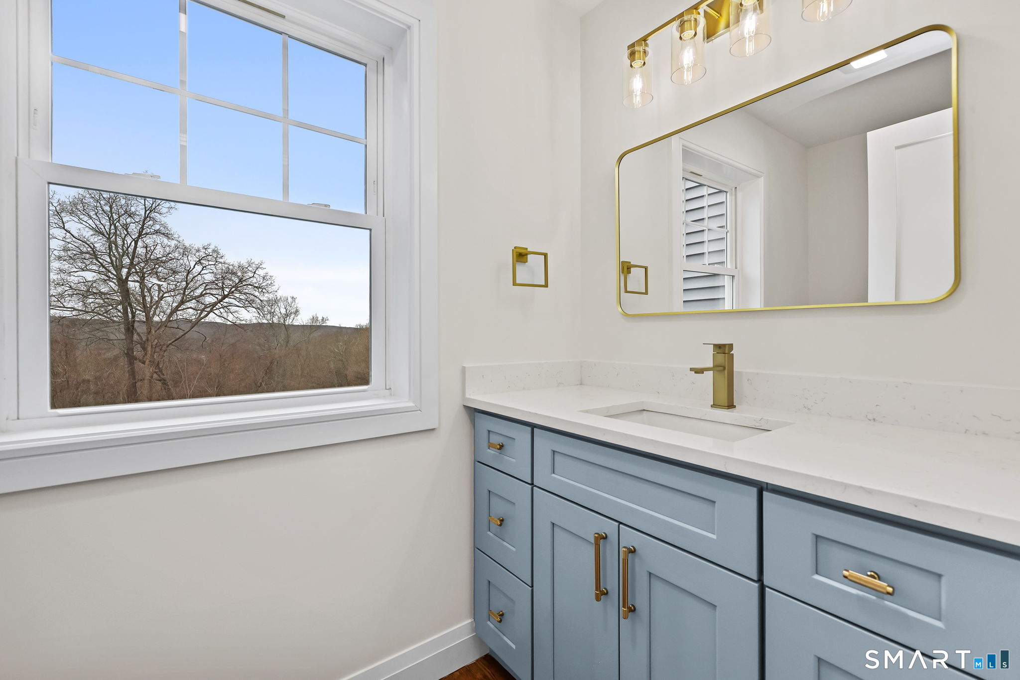 41 Crown View Drive Monroe, CT 06468 - Photo 19 of 41 a bathroom with a sink and a mirror