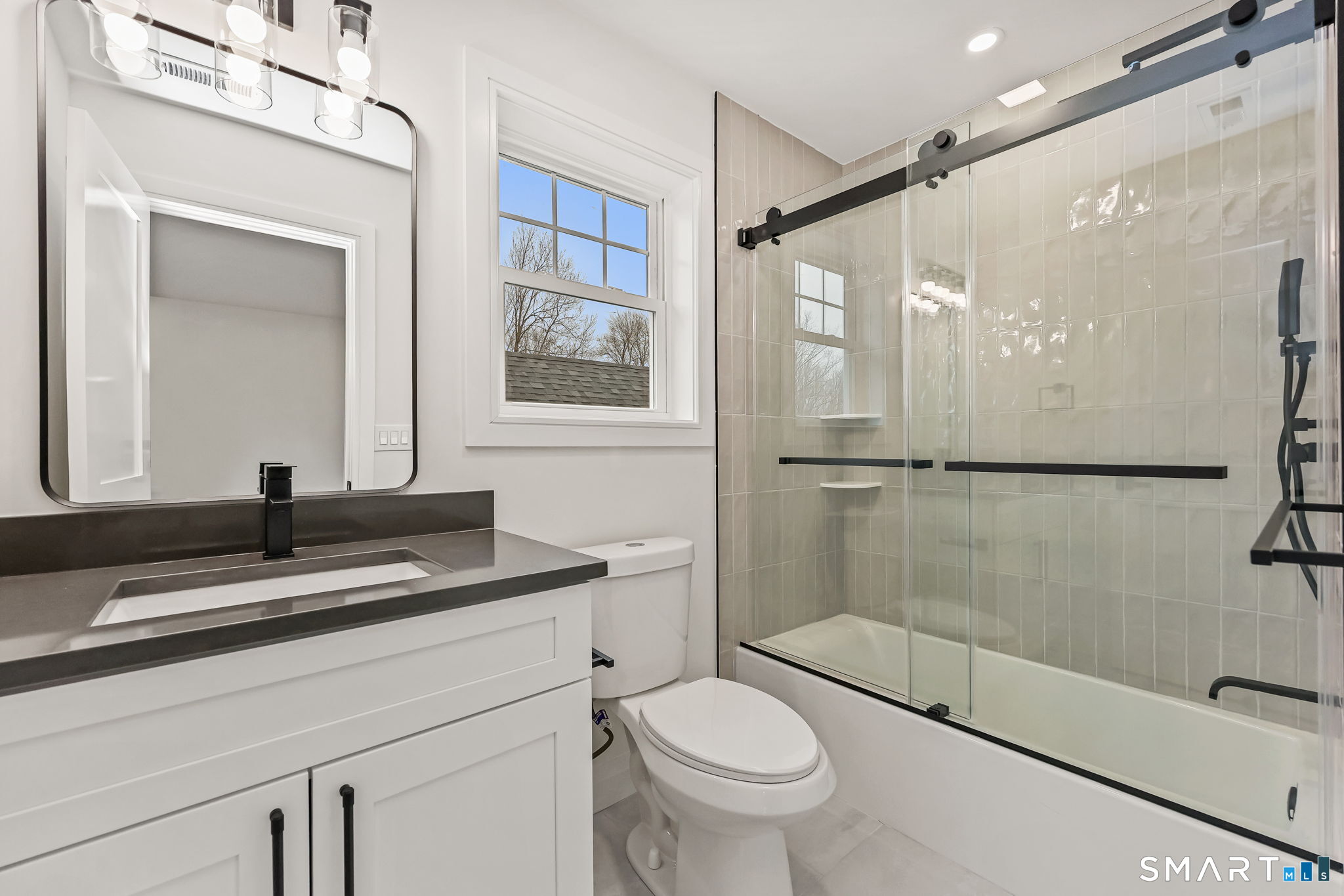 41 Crown View Drive Monroe, CT 06468 - Photo 27 of 41 a bathroom with a sink a toilet and shower