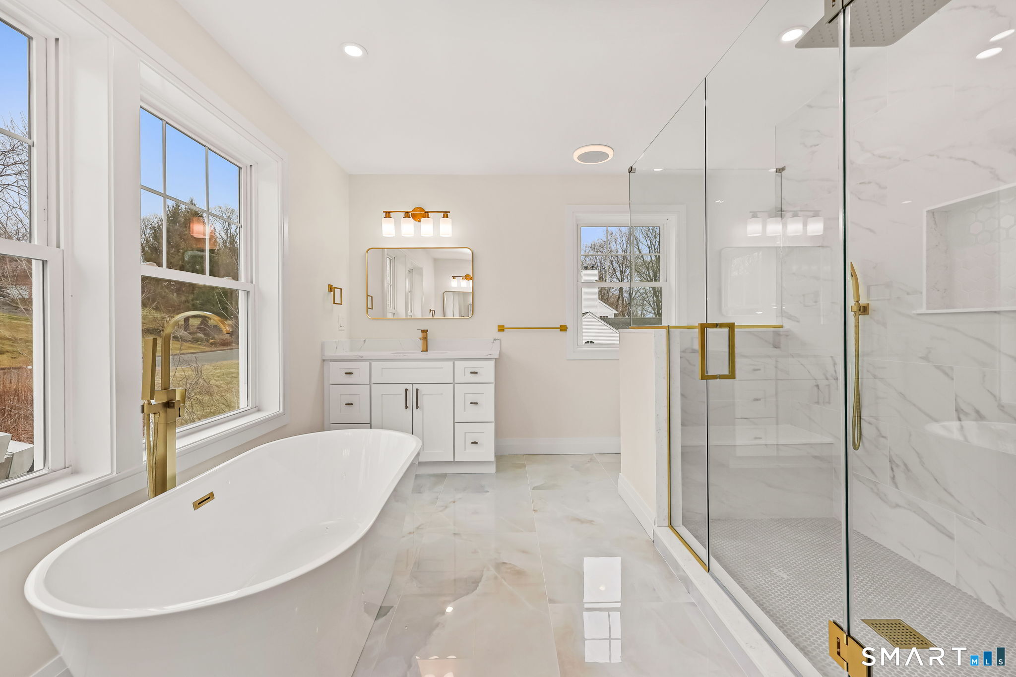 41 Crown View Drive Monroe, CT 06468 - Photo 28 of 41 a bathroom with a tub sink shower and mirror