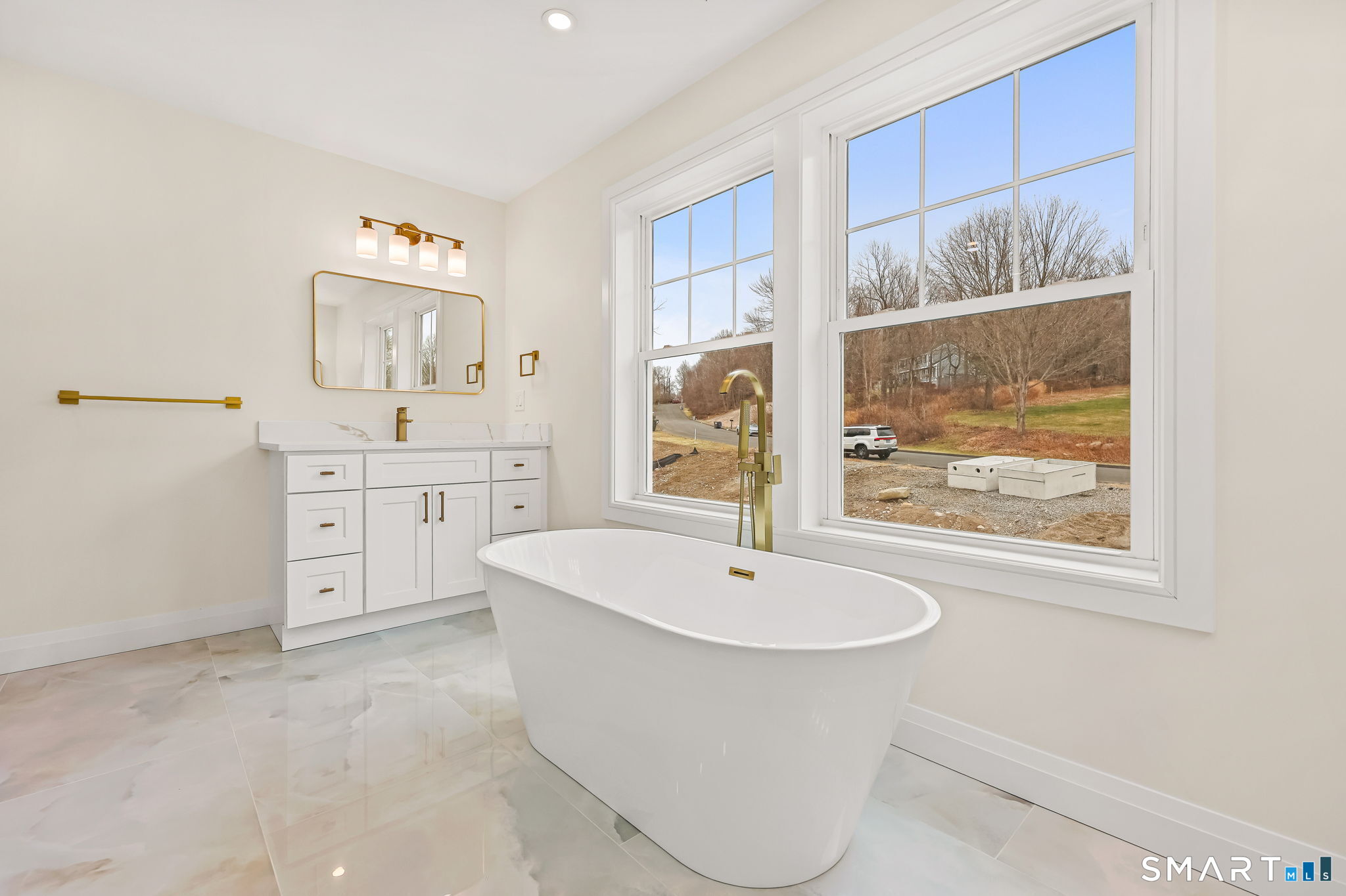 41 Crown View Drive Monroe, CT 06468 - Photo 29 of 41 a white bath tub sitting next to a white sink