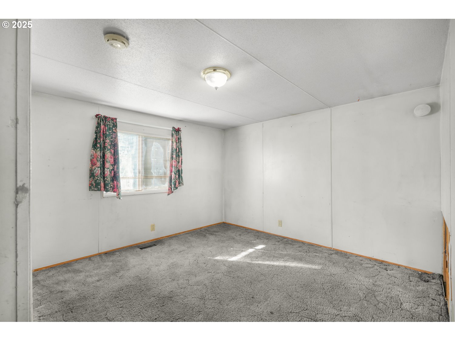 1500 Gabriela Court Northeast, Unit 27 Salem, OR 97301 - Photo 13 of 21 a view of empty room with window
