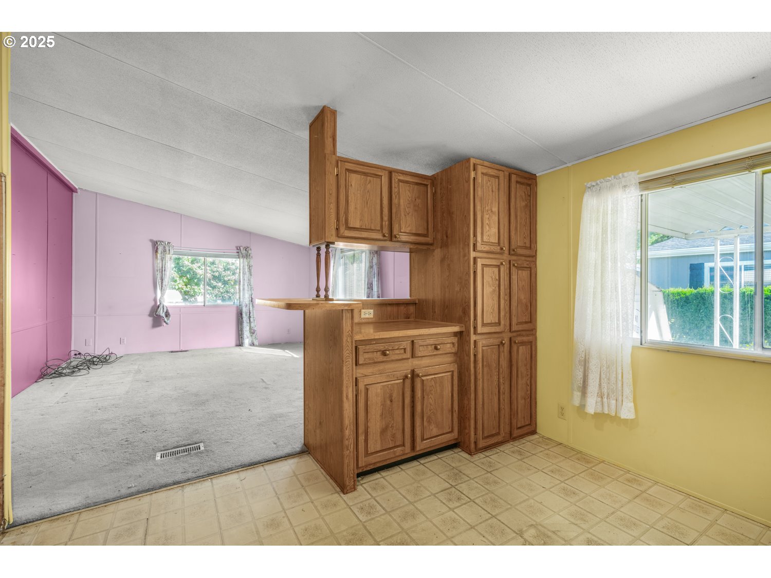 1500 Gabriela Court Northeast, Unit 27 Salem, OR 97301 - Photo 8 of 21 a kitchen with cabinets and wooden floor