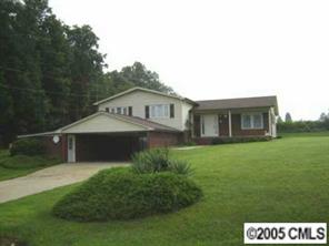 9637 Mull Road Vale, NC 28168 - Photo 4 of 4 a front view of a house with a garden