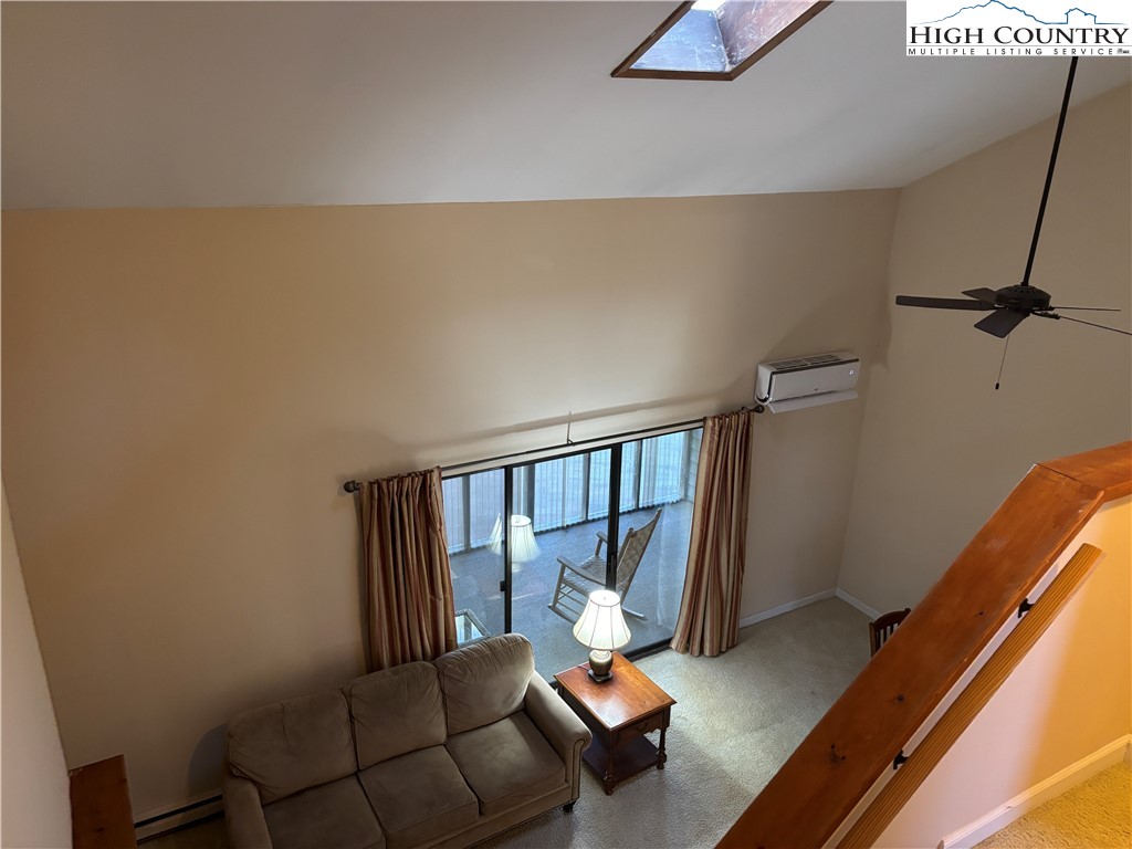 180 Village Drive, Unit 1C4 Boone, NC 28607 - Photo 13 of 23 a living room with furniture
