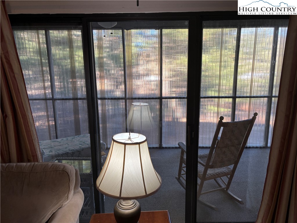 180 Village Drive, Unit 1C4 Boone, NC 28607 - Photo 14 of 23 a view of a room with a large window