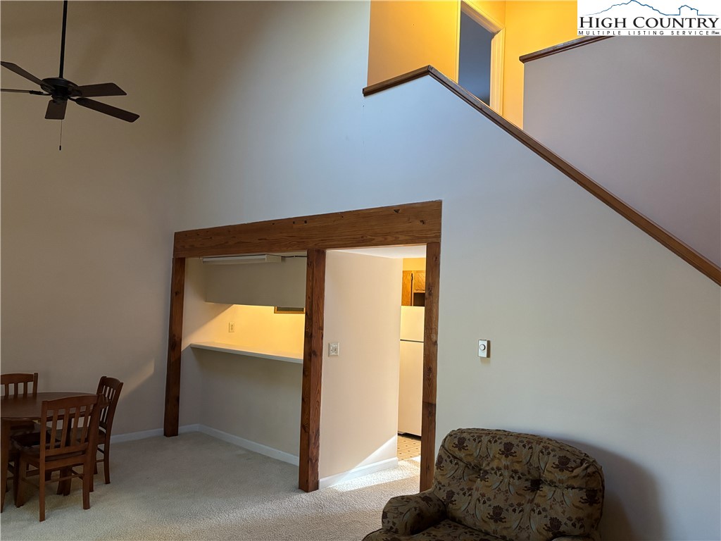 180 Village Drive, Unit 1C4 Boone, NC 28607 - Photo 9 of 23 a bedroom with a bed and a window