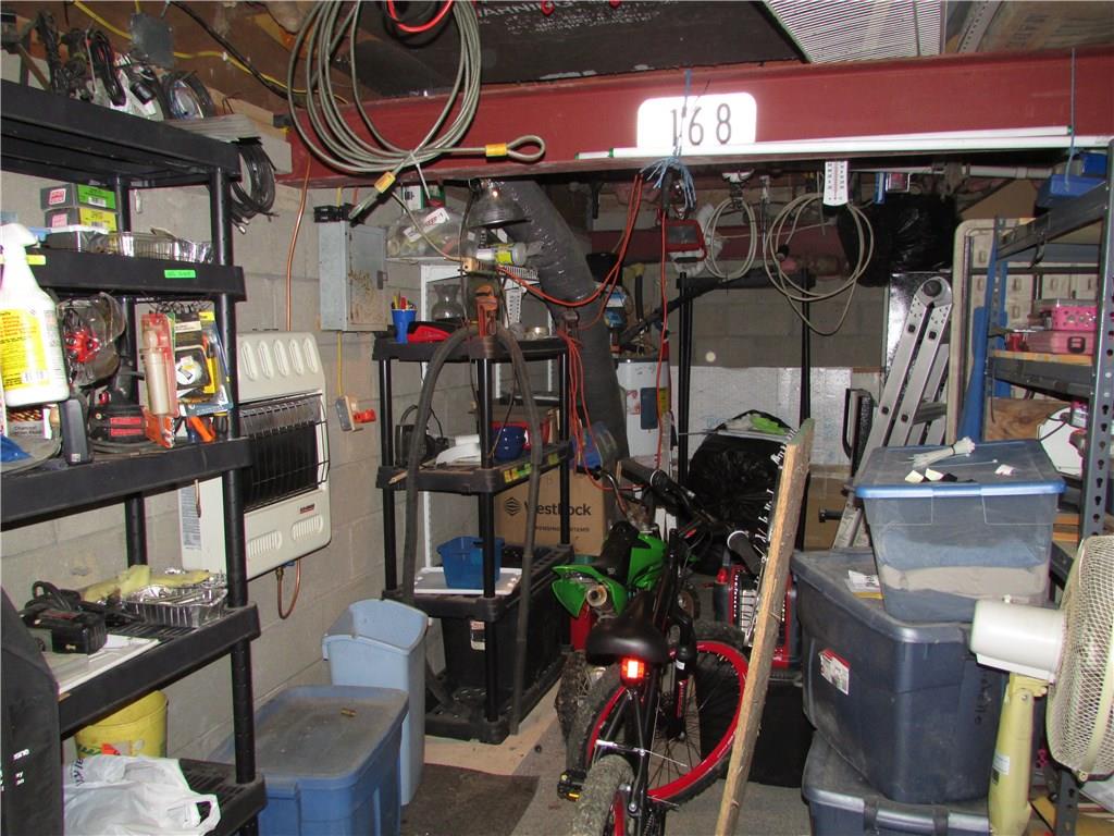168 Gibson Hill Road Georgetown, PA 15043 - Photo 19 of 19 Storage area under 2 room addition. Propane wall heater. Hot water tank and well pressure tank.