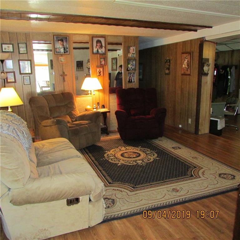 168 Gibson Hill Road Georgetown, PA 15043 - Photo 10 of 19 Large living room with new flooring.