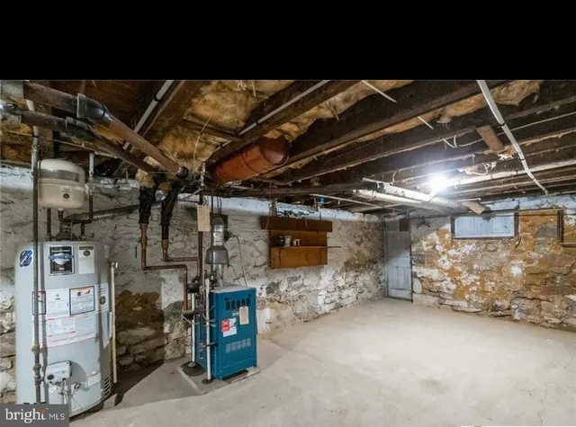 a view of empty room with wooden ceiling