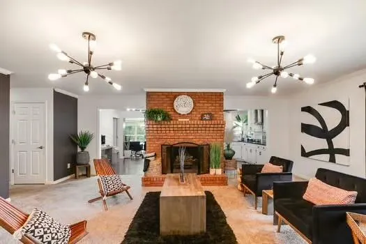 a kitchen with stainless steel appliances white cabinets and a window