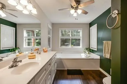 a bedroom with furniture and a potted plant