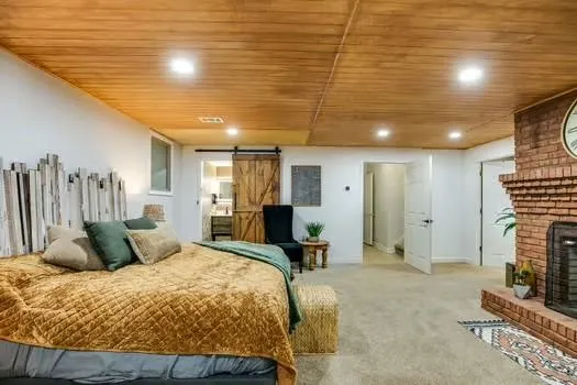 a bathroom with a shower and toilet