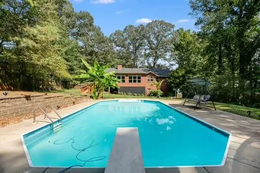 a front view of a house with garage