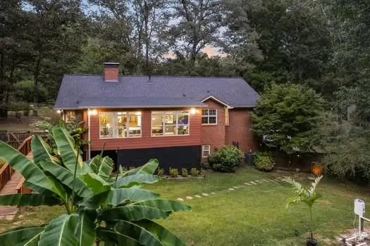 a view of swimming pool from a yard