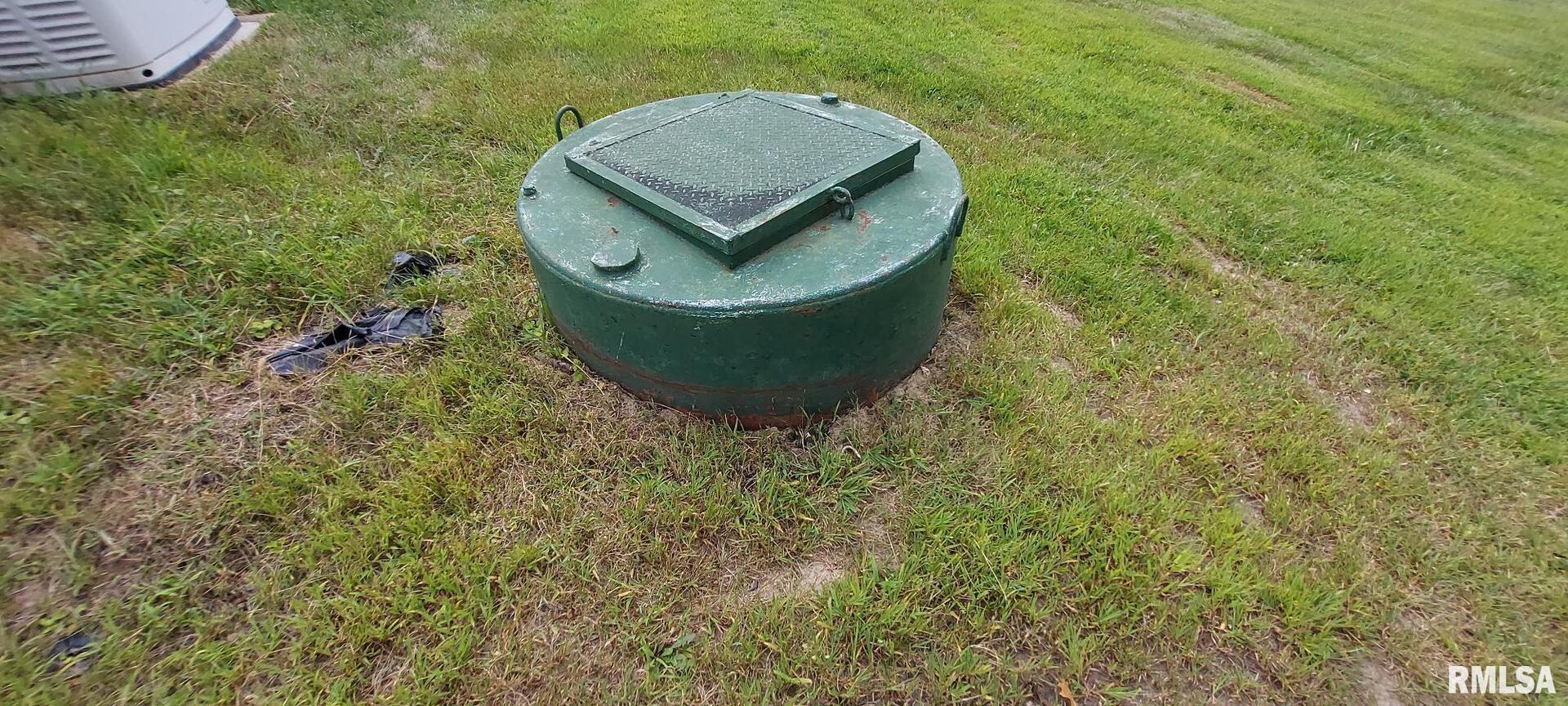 2390 Highway 150 Rio, IL 61472 - Photo 3 of 37 a picture of a wall with a bench and some trees
