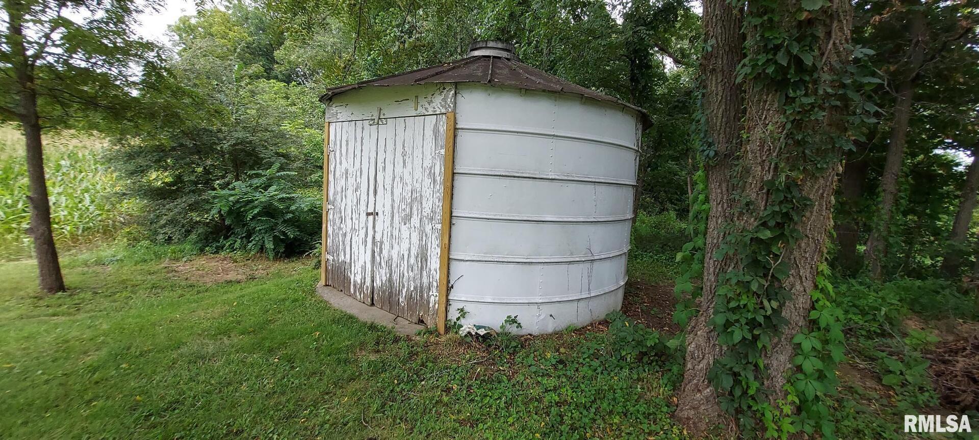 2390 Highway 150 Rio, IL 61472 - Photo 5 of 37 a house view with a outdoor space