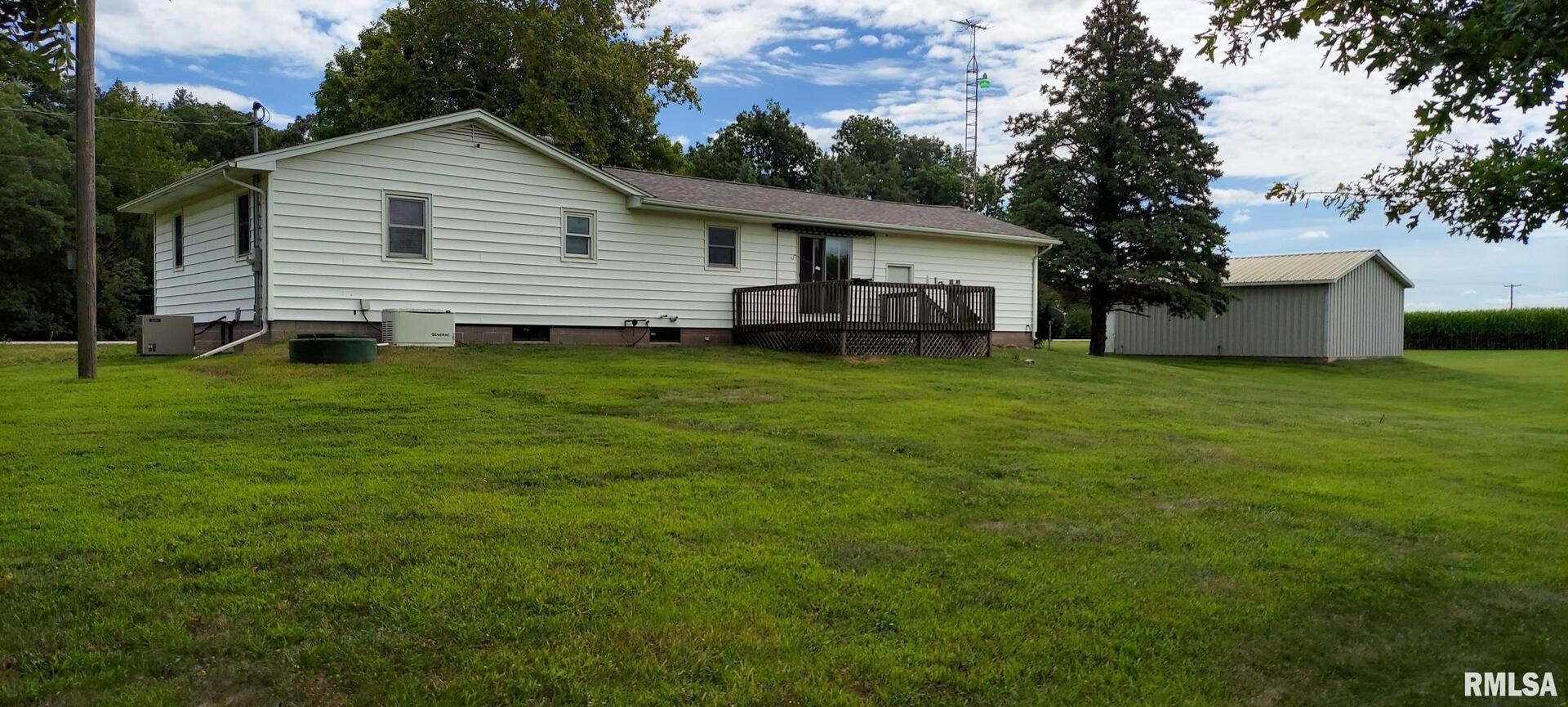 2390 Highway 150 Rio, IL 61472 - Photo 7 of 37 a view of a house with a yard