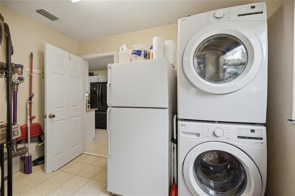 17900 Northwest 120th Avenue Road Reddick, FL 32686 - Photo 45 of 45 a utility room with dryer and washer