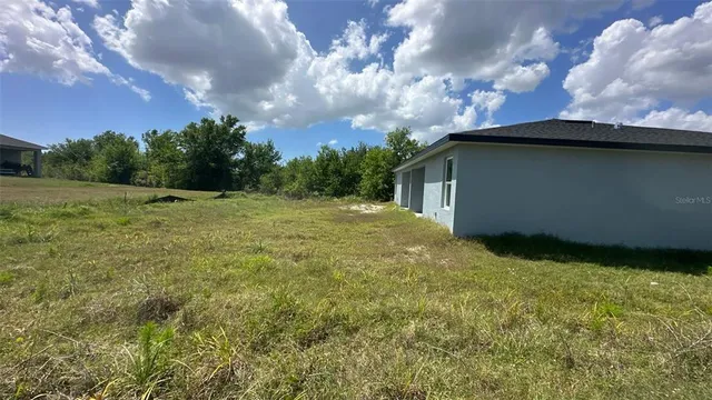 a bathroom with a toilet and a bathtub