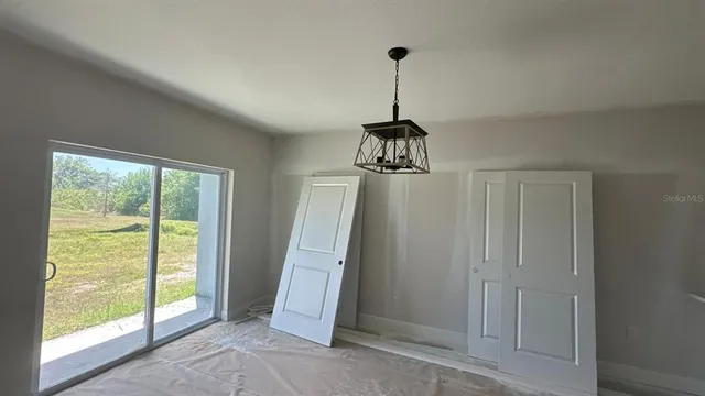 a view of a room with windows