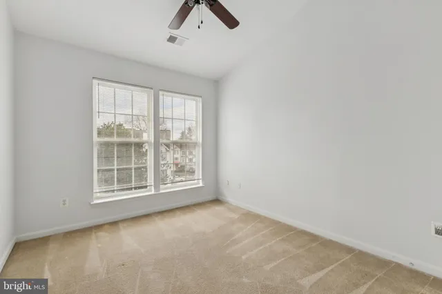 an empty room with window