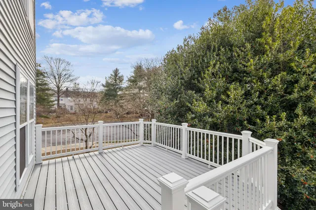 a view of balcony with wooden floor