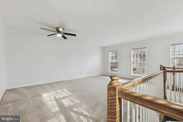 a view of a hallway with closet