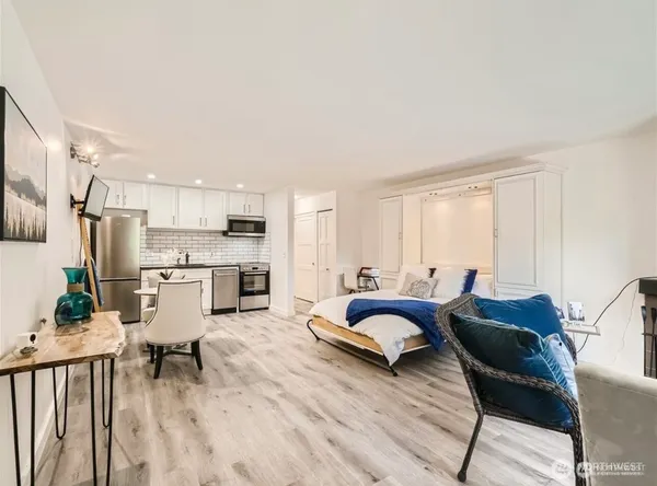 a living room with furniture and a table