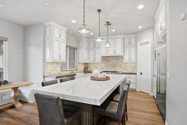 a shelf with books and knick knacks on it