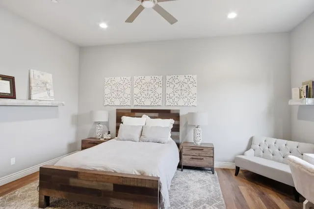 a open kitchen with stainless steel appliances granite countertop a sink a stove and a wooden cabinets