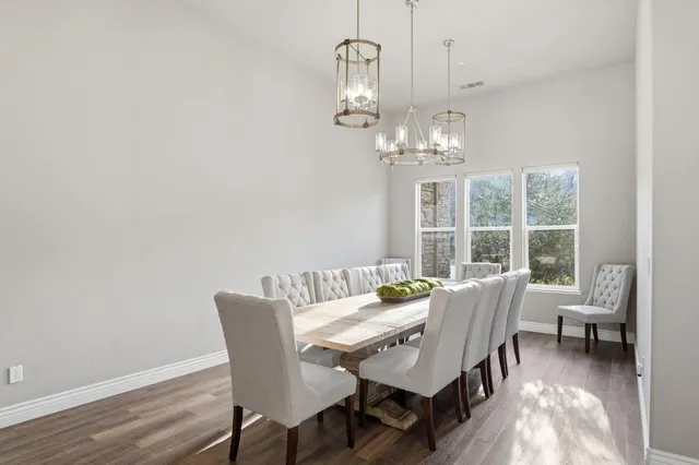 a living room with fireplace furniture and a flat screen tv