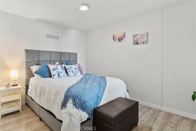 a bed room with a bed and a couch