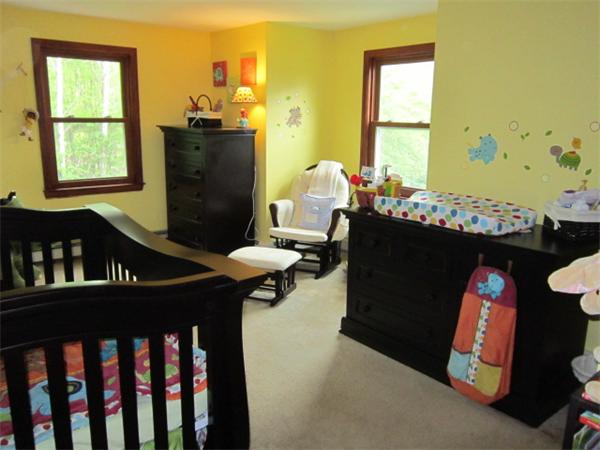 9 Halcyon Farm Road Lakeville, MA 02347 - Photo 13 of 13 a black leather couch in front of a window