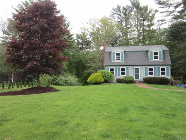 9 Halcyon Farm Road Lakeville, MA 02347 - Photo 3 of 13 a front view of a house with a yard