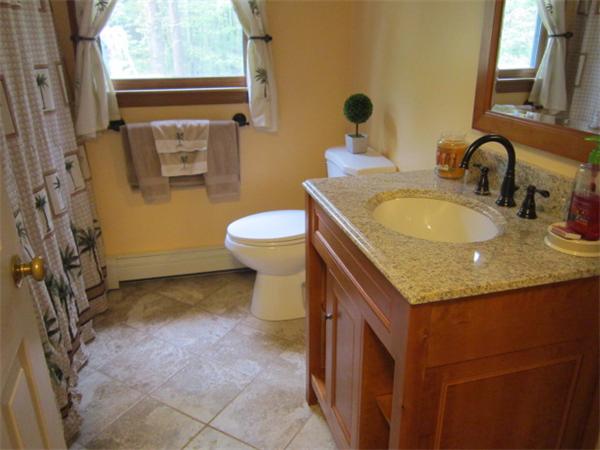 9 Halcyon Farm Road Lakeville, MA 02347 - Photo 7 of 13 a bathroom with a granite countertop sink and a mirror