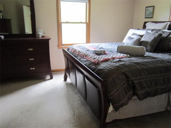 9 Halcyon Farm Road Lakeville, MA 02347 - Photo 10 of 13 a bedroom with a bed and a window