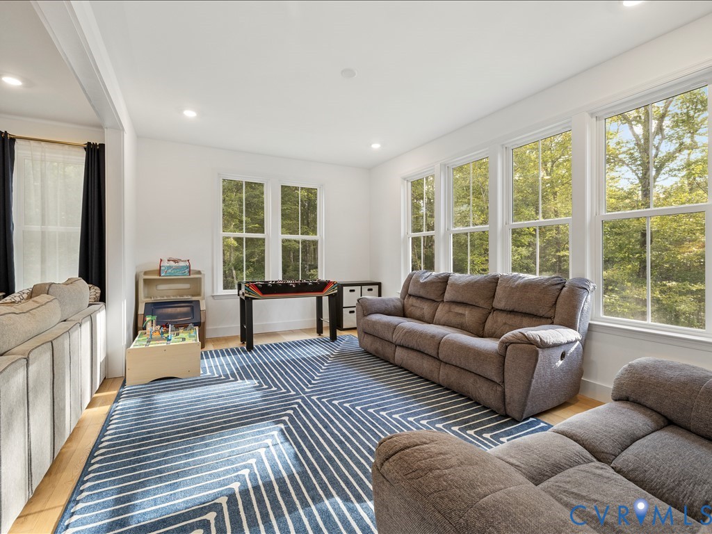 4021 Tredon Road Mechanicsville, VA 23111 - Photo 12 of 50 a living room with furniture and a large window