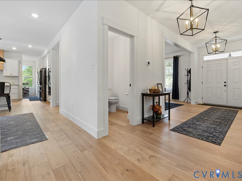 4021 Tredon Road Mechanicsville, VA 23111 - Photo 21 of 50 a living room with furniture and a rug