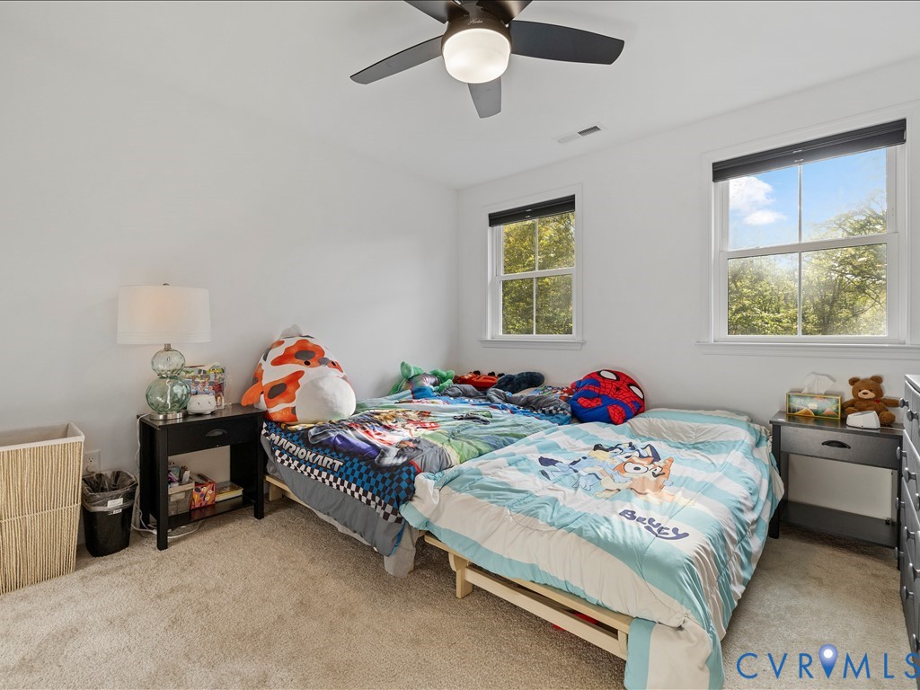 4021 Tredon Road Mechanicsville, VA 23111 - Photo 25 of 50 a bedroom with two beds and a window