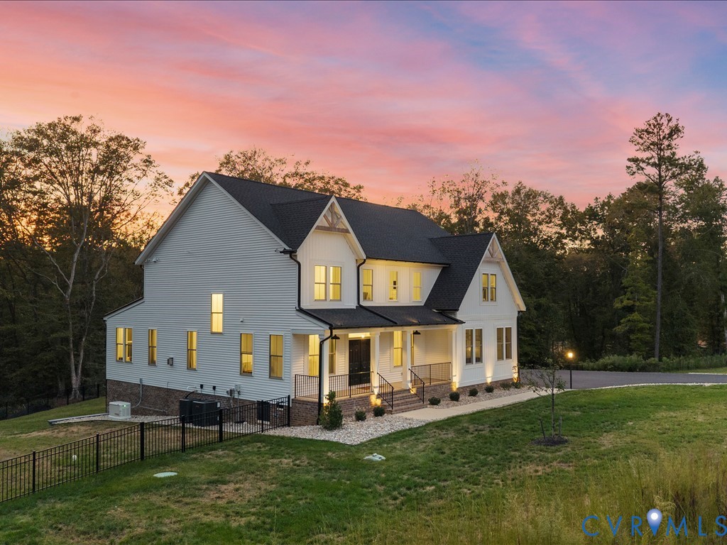 4021 Tredon Road Mechanicsville, VA 23111 - Photo 37 of 50 a front view of a house with a yard table and chairs