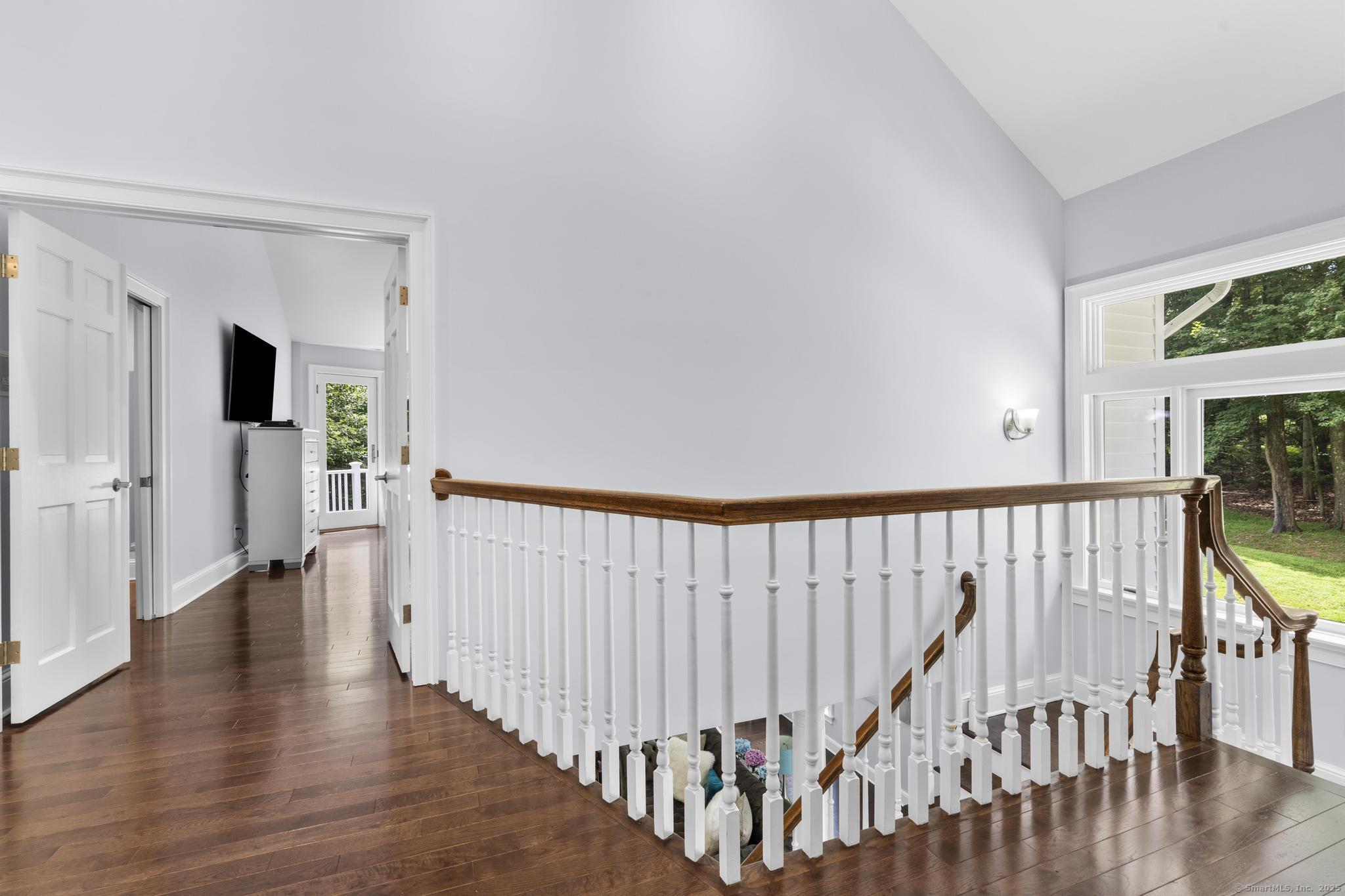 101 Brambly Hedge Circle Fairfield, CT 06824 - Photo 17 of 40 a view of an entryway with wooden floor
