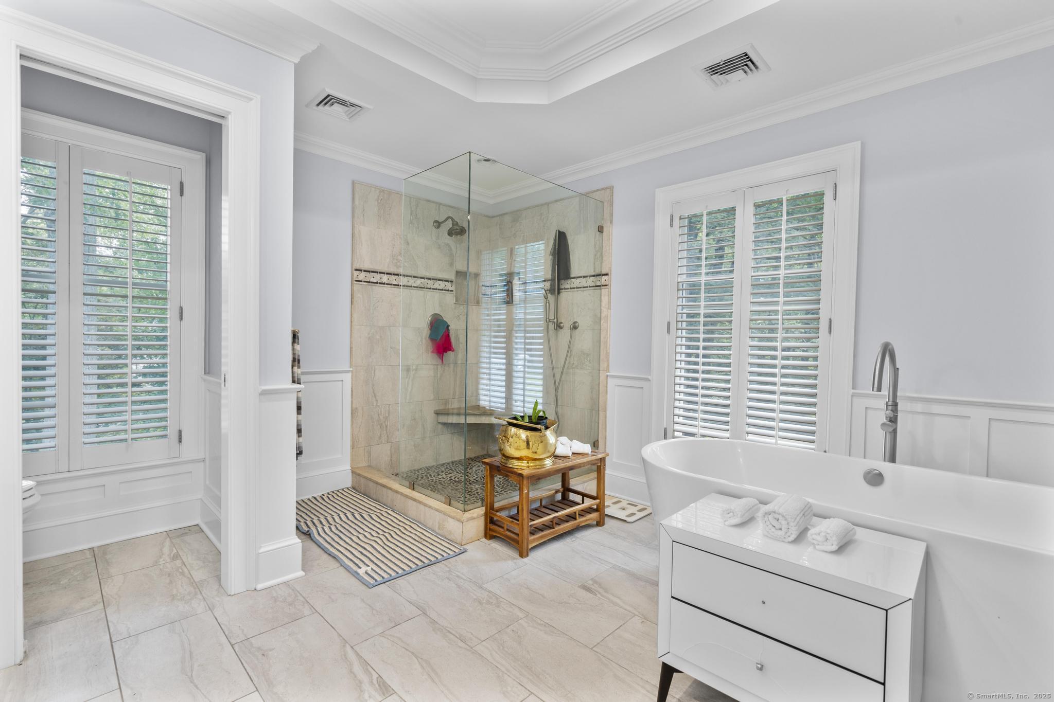 101 Brambly Hedge Circle Fairfield, CT 06824 - Photo 22 of 40 a bedroom with furniture and a window