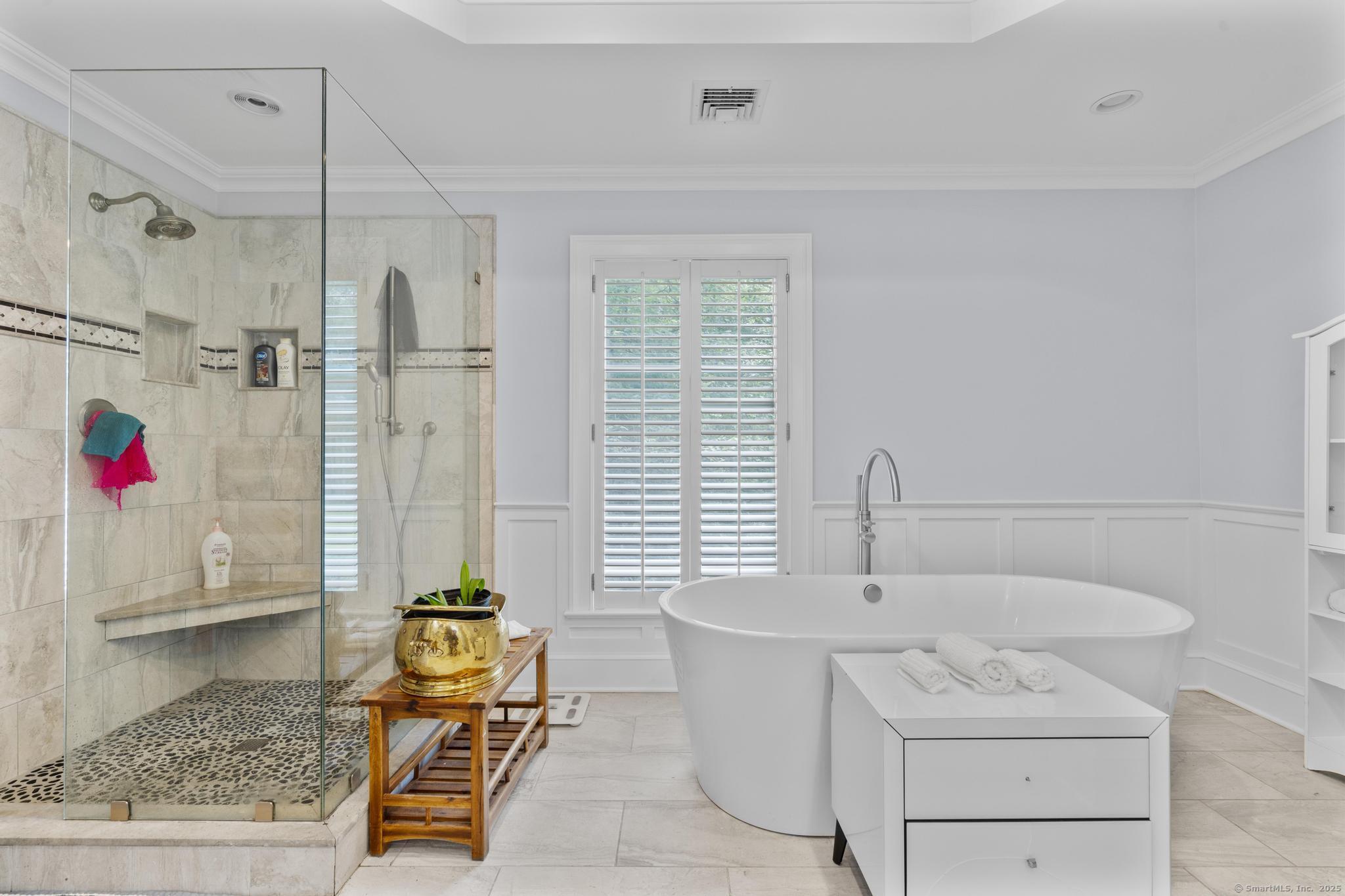 101 Brambly Hedge Circle Fairfield, CT 06824 - Photo 23 of 40 a bath room with a sink and tub