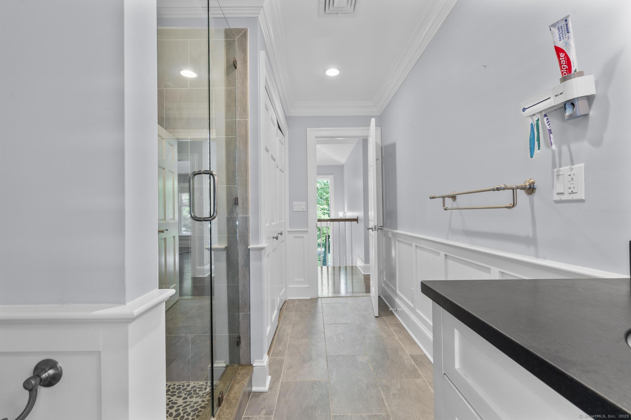 101 Brambly Hedge Circle Fairfield, CT 06824 - Photo 27 of 40 a bathroom with a shower and a sink