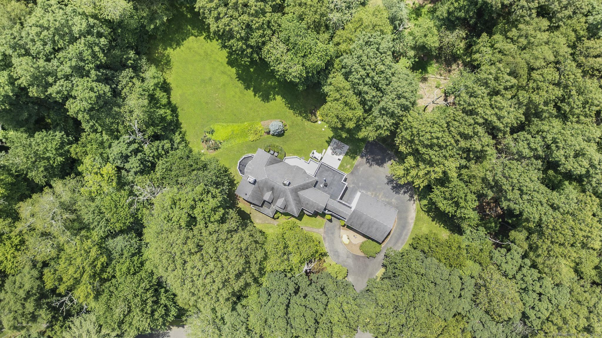 101 Brambly Hedge Circle Fairfield, CT 06824 - Photo 40 of 40 an aerial view of a house with a yard and lake view