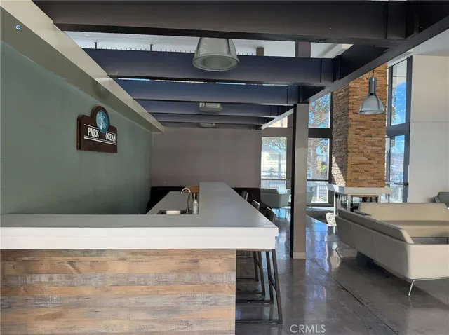a hallway with wooden floor