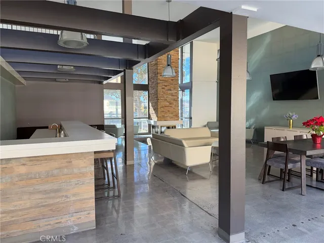 a room with gym equipment and a mirror