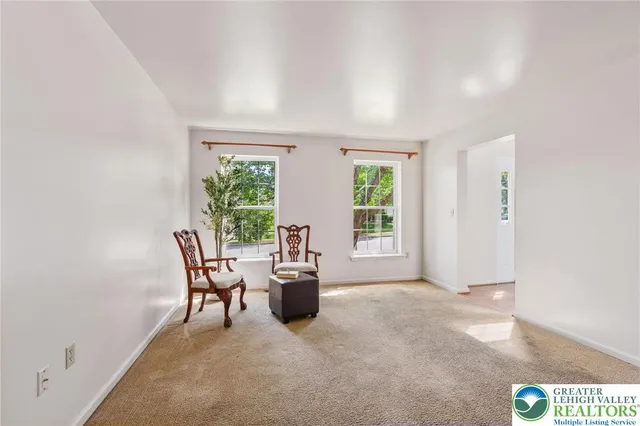 a livingroom with furniture and windows